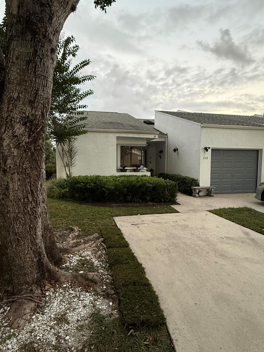 Photo of 242 Par Drive, Royal Palm Beach, FL 33411 (MLS # R11136337)