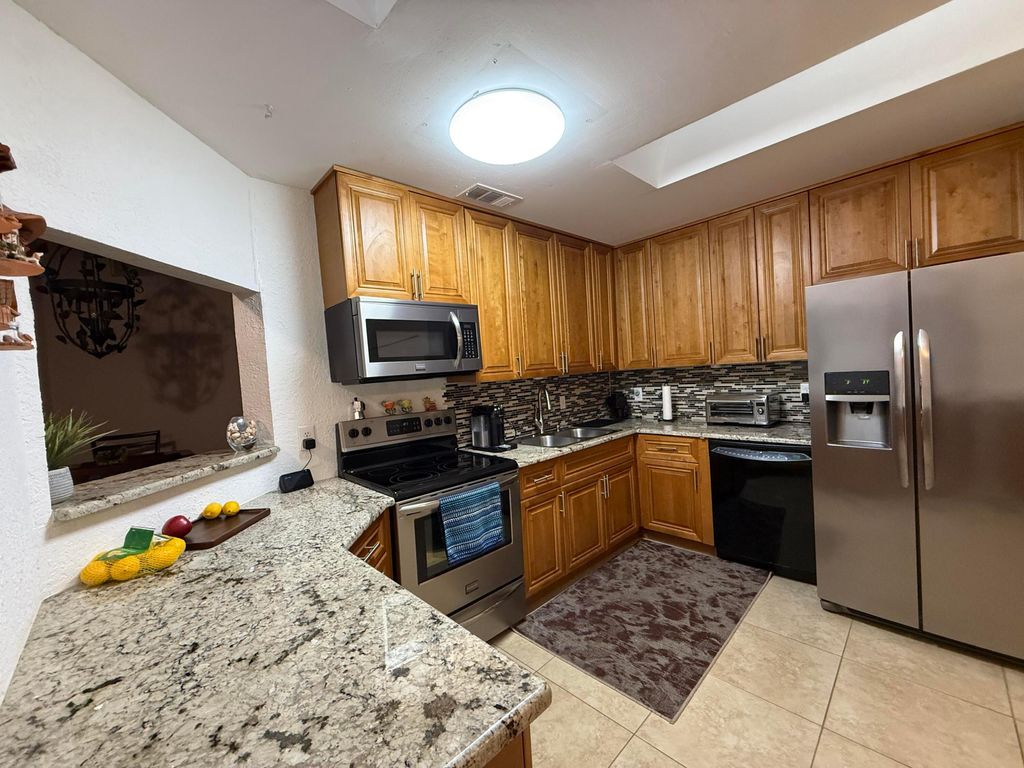 Photo of 242 Par Drive, Royal Palm Beach, FL 33411 (MLS # R11136337)