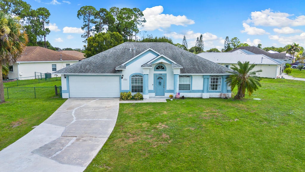 Photo of 1526 SW Santander Avenue, Port Saint Lucie, FL 34953 (MLS # B26065767)