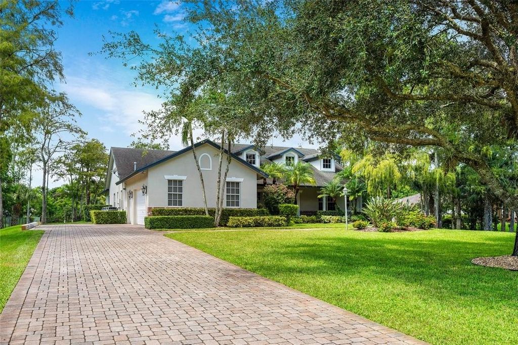 Photo of 5919 NW 74th Terrace, Parkland, FL 33067 (MLS # F10454192)
