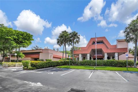 Photo of 3160 Holiday Springs Boulevard #7-104, Margate, FL 33063 (MLS # R11137849)