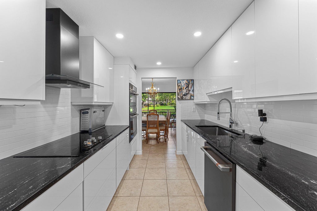 Photo of 6864 Willow Wood Drive #405, Boca Raton, FL 33434 (MLS # B26049469)