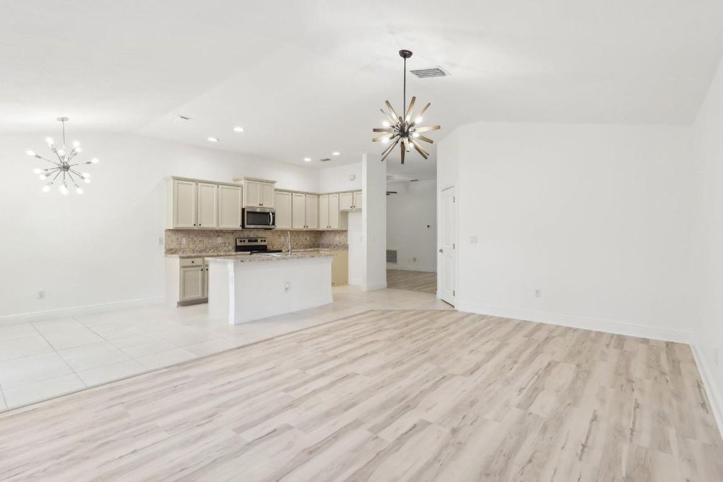 Photo of 819 NE Whistling Duck Way, Port Saint Lucie, FL 34983 (MLS # R11066143)