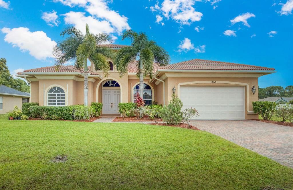 Photo of 6063 NW Winfield Drive, Port Saint Lucie, FL 34986 (MLS # R10754801)