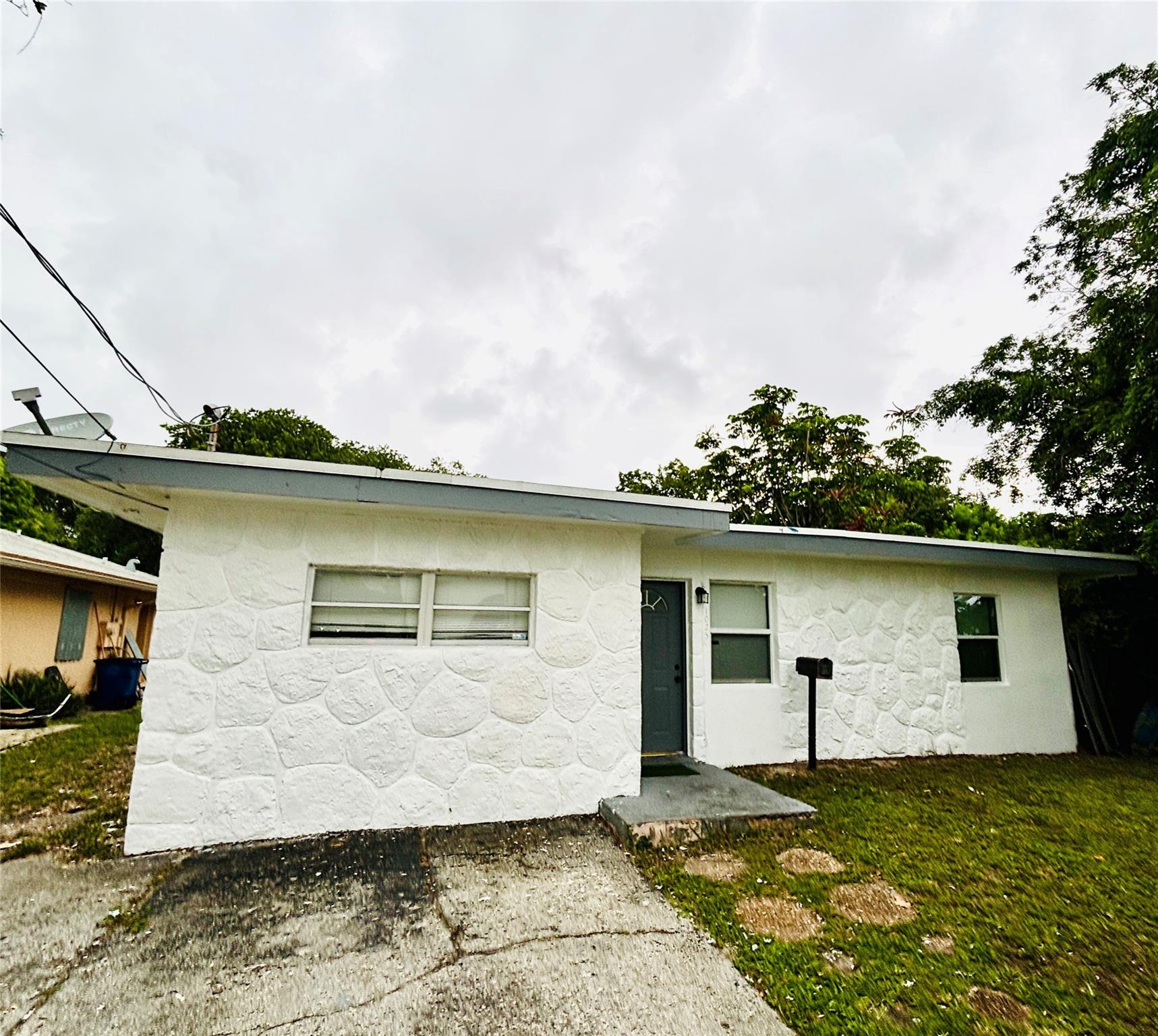 Great opportunity for a first-time homebuyer to own a 3-bedroom, 2-bathroom home in the desired area of Hallandale Beach. The house is very well located, near Hallandale High School and a shopping center. It is less than 5 minutes to Interstate 95 and all major roads. The master bedroom has been converted into an efficiency that is currently rented until September 30th, but it is easy to convert back to its original form. The house is on lockbox and very easy to show. The roof was replaced in 2019, and the electrical panel was updated in 2020.