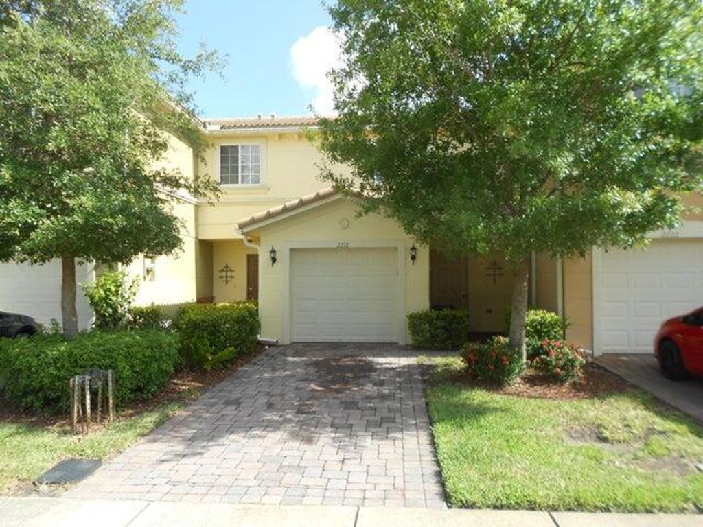 Photo of 2218 SW Rockport Road, Port Saint Lucie, FL 34953 (MLS # R11153308)