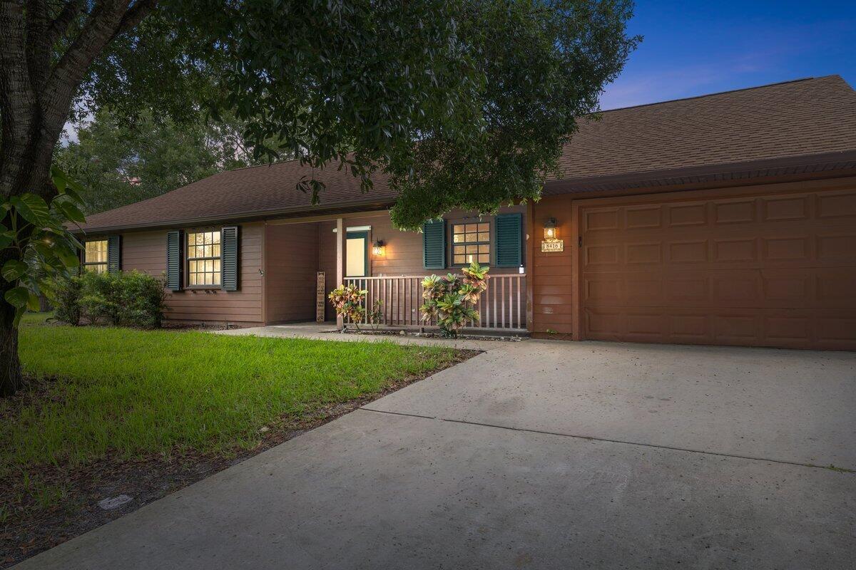 Nestled on nearly 0.67 acres across three parcels, this charming 3-bedroom, 2-bath home offers true countryside allure in Vero Lake Estates. The light-filled living space showcases vaulted ceilings with a rich wood finish, while the open kitchen -- updated with newer appliances (2024) -- and a convenient breakfast bar make everyday meals and casual entertaining a delight. Freshly painted in 2025, the home also features updated fixtures and fans (2025), a laundry room, and a full two-car garage with epoxy flooring. Outside, relax by the private pool with a pool pump replaced in 2024, enjoy the fenced yard with a shed and chicken coop, and rest easy under the brand-new roof (2023). Additional upgrades include an A/C (2017), water heater (2019), and owned water softener (2024).