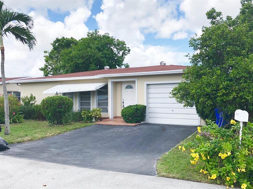 This adorable 2 bedroom 2 bath has been freshly painted, new tile floors throughout most of the house, new kitchen appliances and much more! This home also includes a 322 sqft extra bonus room. Perfect for a family room or converting into another bedroom. The backyard has mature fruit trees and lush landscaping. This home wont last so don't wait...