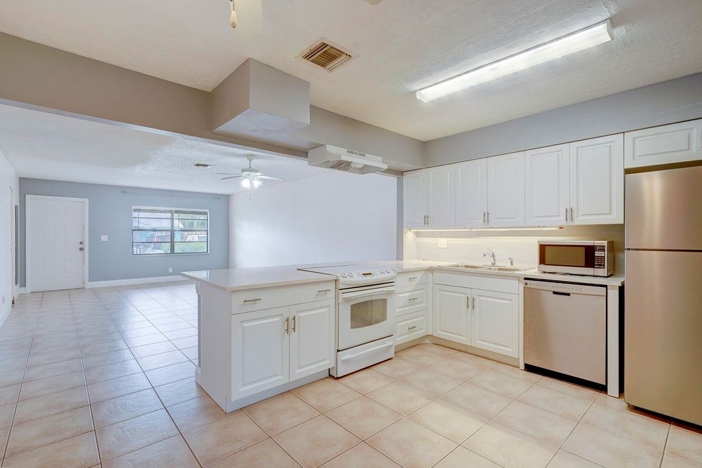 Photo of 3929 Kenas Street, Palm Beach Gardens, FL 33403 (MLS # B26011306)