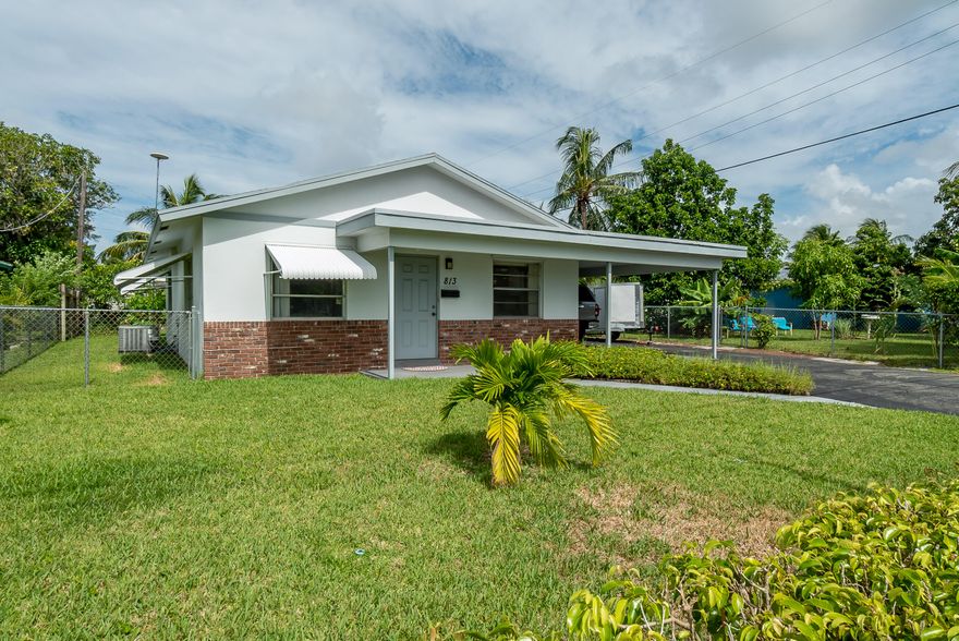 Wonderful 2 Bedroom, 1 Bath property with extended carport and utility room, zoned R2 Duplex on a .1411 Acre Lot close to the downtown redevelopment area, new Library/City Hall and Cultural Arts Center.  Just 1.8 miles to the beautiful beaches.  Updated eat-in kitchen and bathroom, tile floors in living areas, carpeting in bedrooms.  GE Electrical Panel, A/C - 2016. Fenced rear yard with a covered patio area, fruit trees and a large storage shed. Make this property your own oasis.  Great location - centrally located.