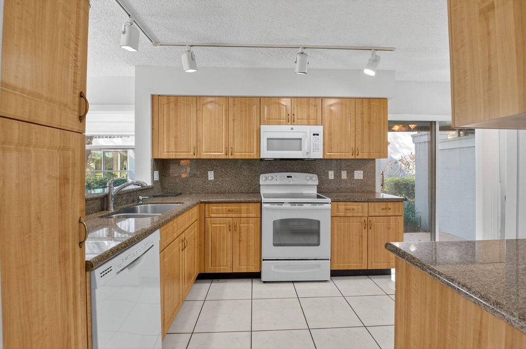 Photo of 7342 Lake Meadow Way #102, Boynton Beach, FL 33437 (MLS # R11141714)