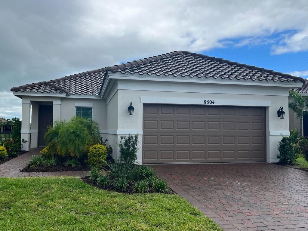Photo of 9504 SW Royal Poinciana Drive, Port St Lucie, FL 34987 (MLS # R10894694)