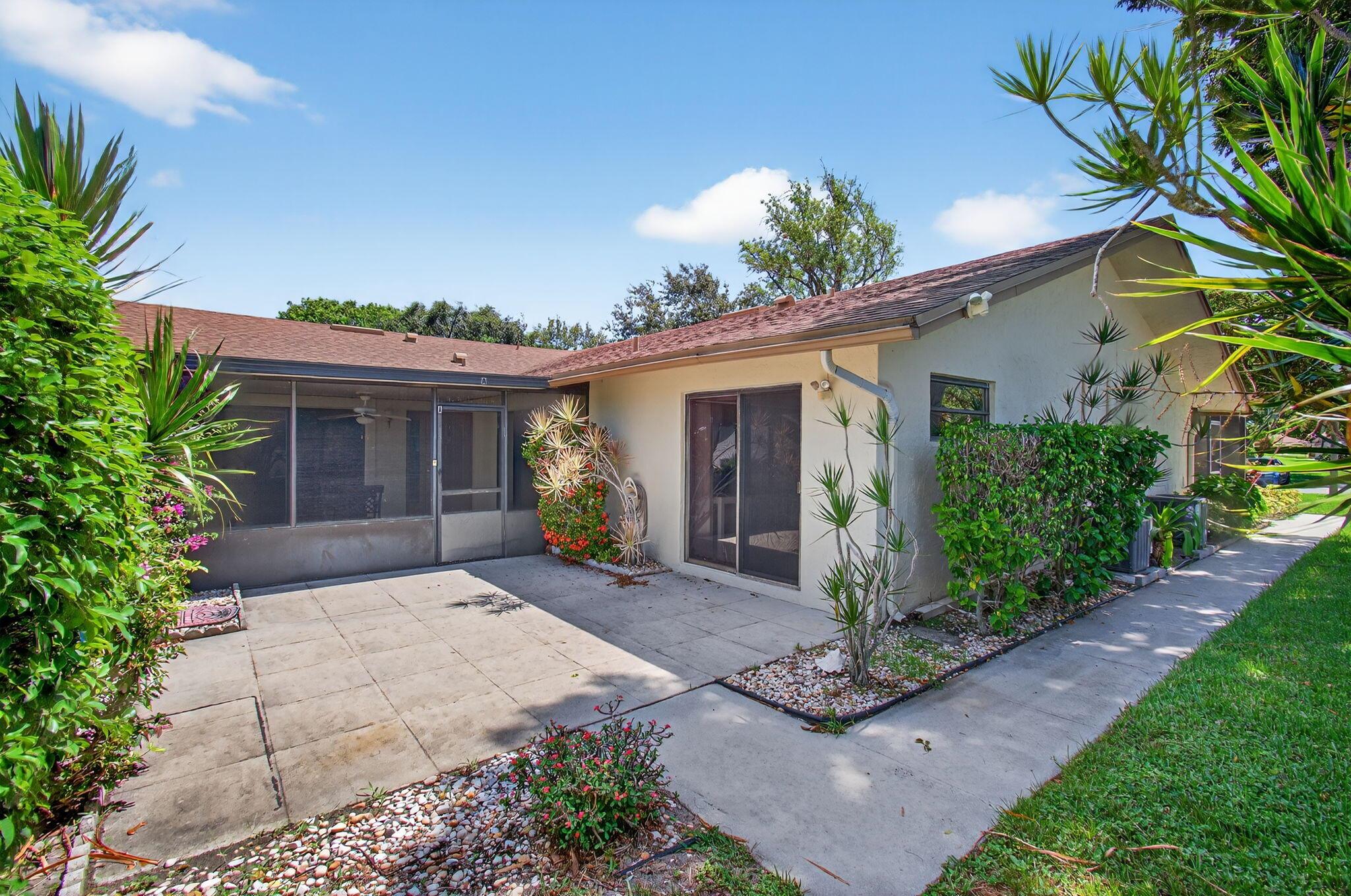 Embodying a delicate balance between the excitement of city life and the ease of suburban tranquility, the property at 872 Northwest 29th Avenue, Delray Beach, FL, beckons potential homeowners with a promise of unparalleled comfort and convenience to the Rainberry Bay community. This residence is ideally situated a brief, leisurely stroll from one of this vibrant community' immaculately maintained pools.Upon entrance, one is greeted by an atmosphere that seamlessly blends elements of comfort and sophistication. The main bedroom has a generously proportioned walk-in closet, a magnificent testament to the home's thoughtful design and practicality. This expansive closet offers ample storage space, catering for all storage needs while encouraging a clutter-free, serene living environment.