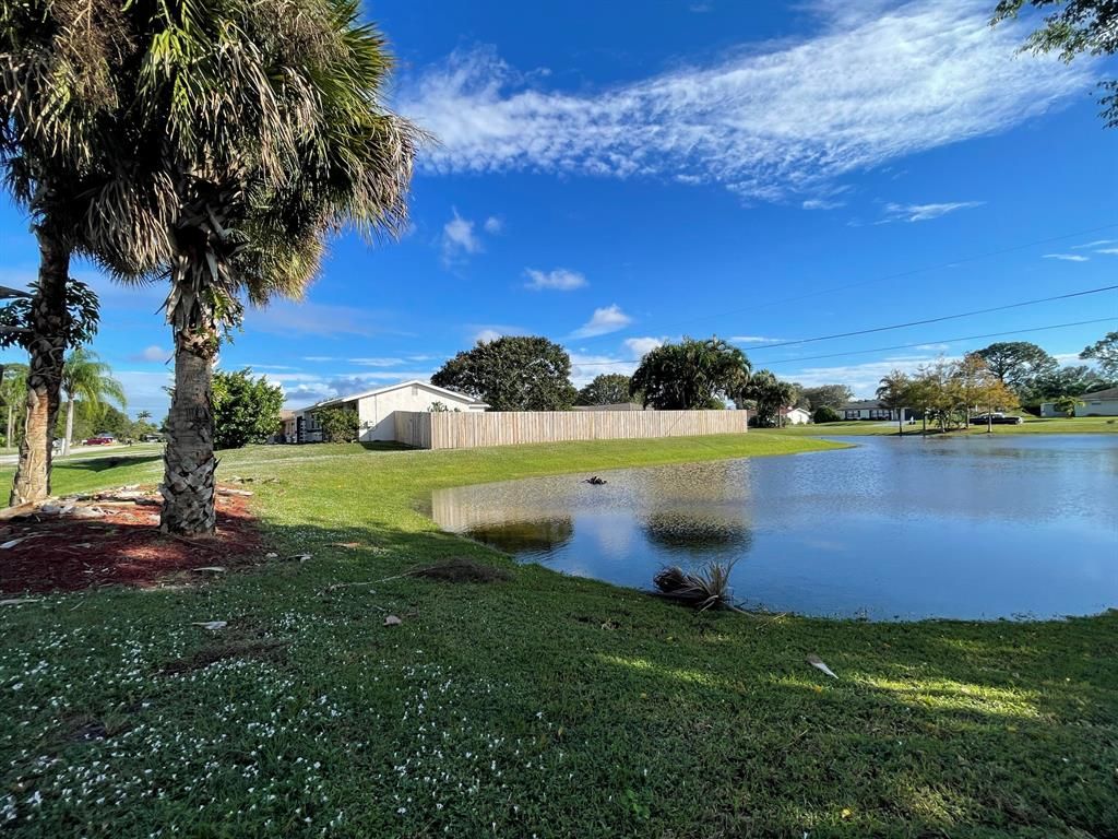 Photo of 710 SE Hollahan Avenue, Port Saint Lucie, FL 34983 (MLS # R10760597)