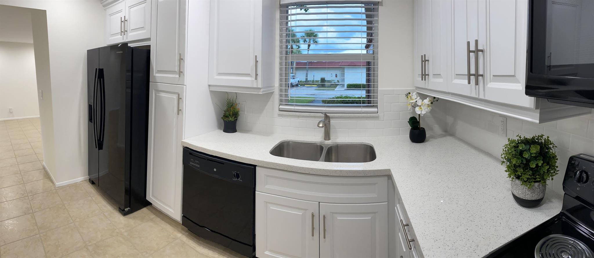 Beautiful Move-In Ready 1st Floor home with LAKE VIEWS! Welcome to Golden Lakes a 55+, Friendly & Quiet place to call Home! Gorgeous White Kitchen with Quartz counters & backsplash, Freshly painted, Neutral Tile floors throughout. Tranquil Waterfront Views of the Lake from Both the Living & Dining Rooms, Both Bedrooms And the Patio! This Open and Spacious LAKEFRONT Condo offers split bedroom floor plan also. Enjoy the 2 Clubhouses, HEATED POOLS & So Many Social Activities & Clubs to join! Across street from Bus Stop! And the Special Assessment Was Already paid by the Seller!