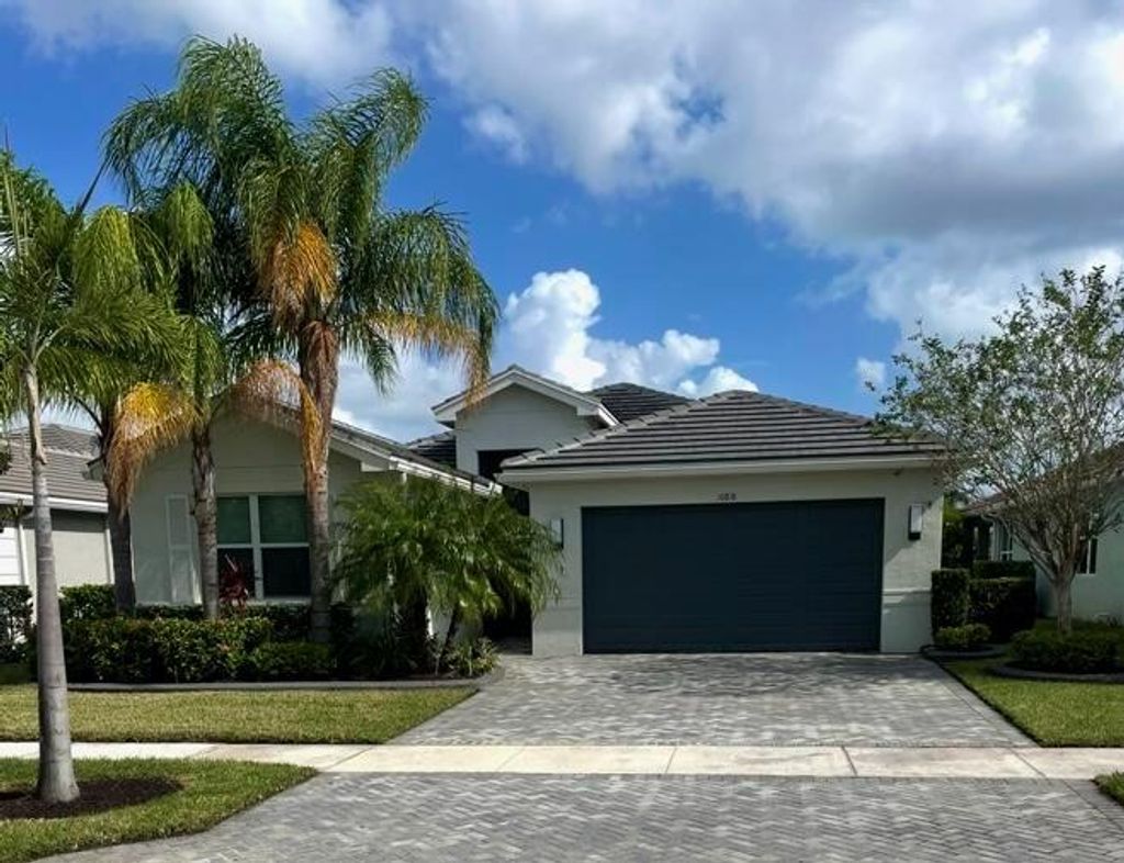 Photo of 10876 SW Sunray Street, Port Saint Lucie, FL 34987 (MLS # R11097997)