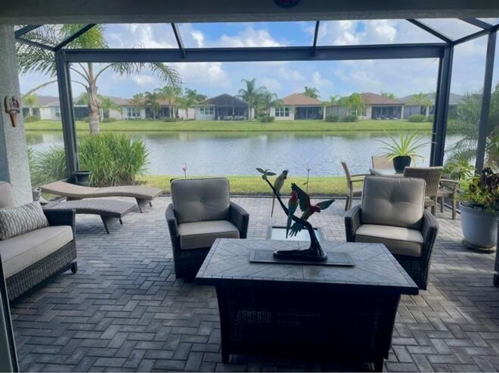 Photo of 10876 SW Sunray Street, Port Saint Lucie, FL 34987 (MLS # R11097997)