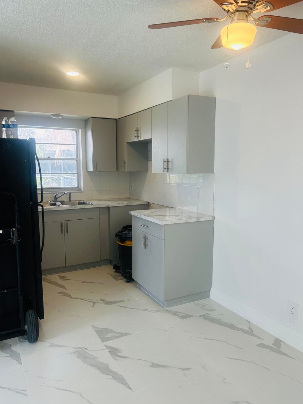 Photo of 1471 NW 20th Street #A, Fort Lauderdale, FL 33311 (MLS # B26016339)