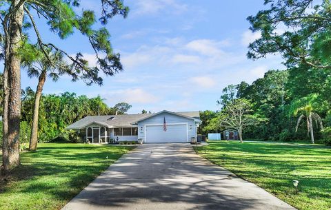 Photo of 5654 SE Orange Blossom Trail, Hobe Sound, FL 33455 (MLS # F10549587)