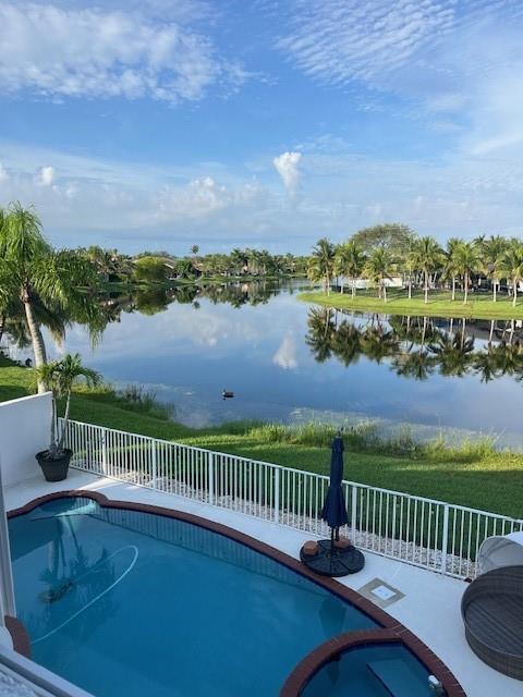 Welcome to this beautifully maintained 4-bedroom, 3 -bathroom home with breathtaking lake views in the highly sought after area of West Pembroke Pines. This rare original owner gem offers a private backyard oasis featuring a heated pool and spa, perfect for relaxing or entertaining. Inside you’ll find numerous upgrades, including all three renovated bathrooms, elegant granite countertops, luxury vinyl plank flooring throughout, and a freshly painted exterior. Located in a top rated school district, this home combines comfort, style and an unbeatable location. Don’t miss your chance to make it yours!