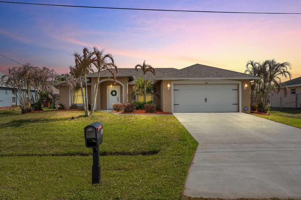 Photo of 400 SW Ridgecrest Drive, Port Saint Lucie, FL 34953 (MLS # B26009779)