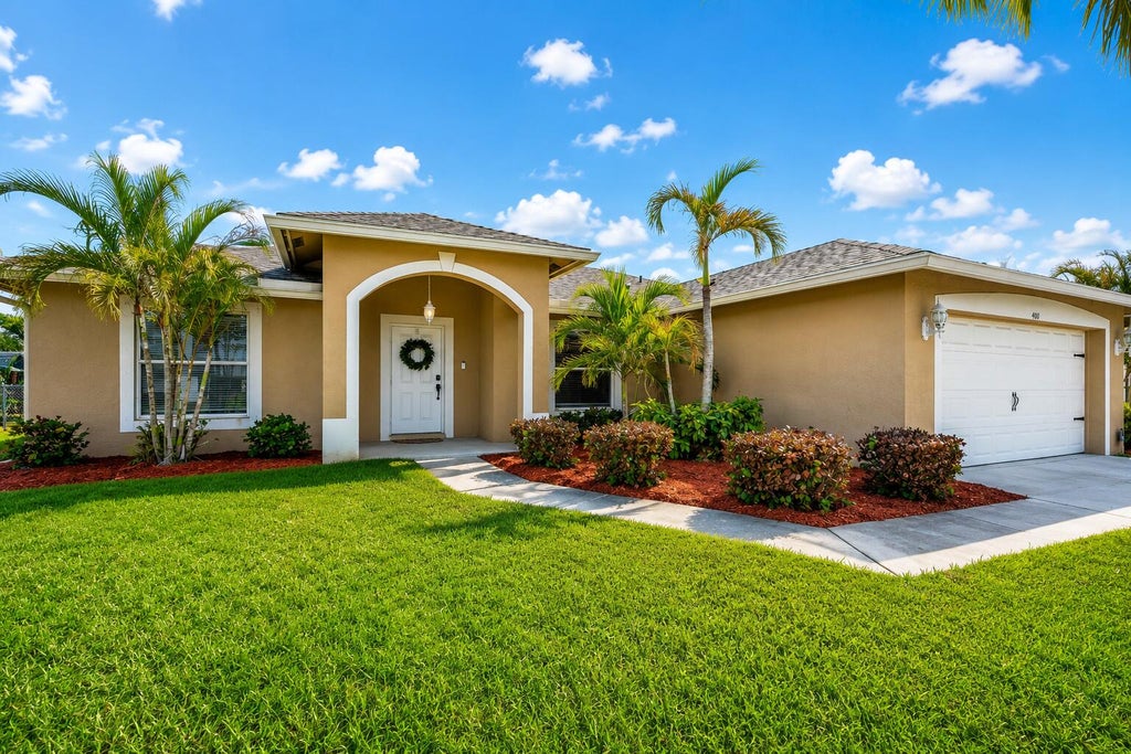 Photo of 400 SW Ridgecrest Drive, Port Saint Lucie, FL 34953 (MLS # B26009779)