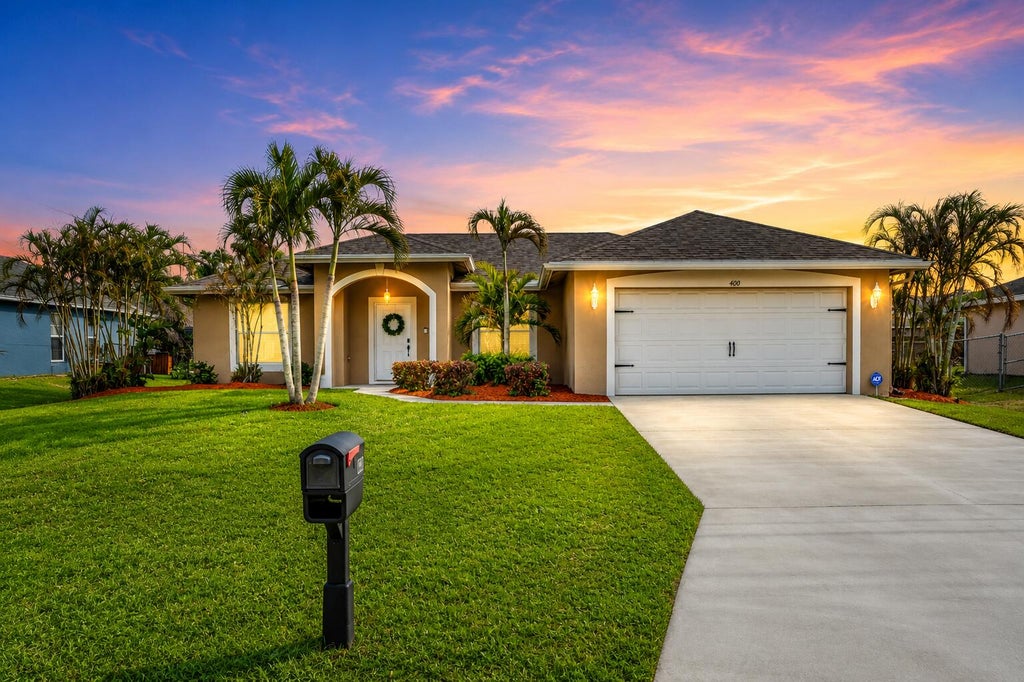Photo of 400 SW Ridgecrest Drive, Port Saint Lucie, FL 34953 (MLS # B26009779)