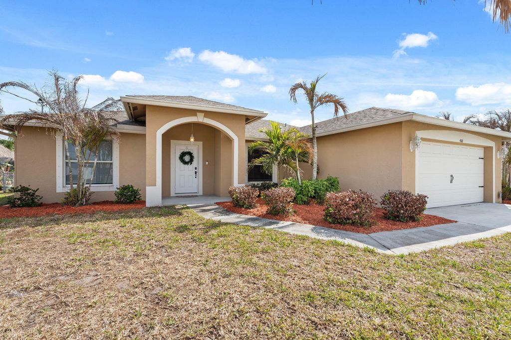 Photo of 400 SW Ridgecrest Drive, Port Saint Lucie, FL 34953 (MLS # B26009779)