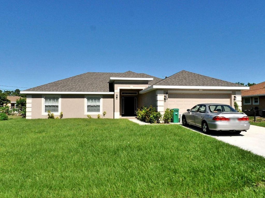 Photo of 973 SW Gwendolen Terrace, Port St Lucie, FL 34953 (MLS # R10899639)