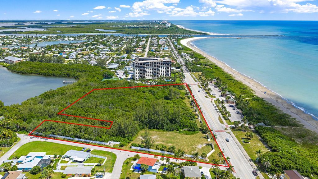 Photo of 901 S Ocean Drive, Fort Pierce, FL 34949 (MLS # R11114044)