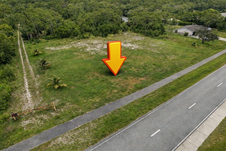 Build your dream home on this clear, ready-to-build 1.33-acre lot with a canal on the side, conveniently located on paved Tangerine Road. Priced for a quick sale — a great opportunity in a desirable area.
