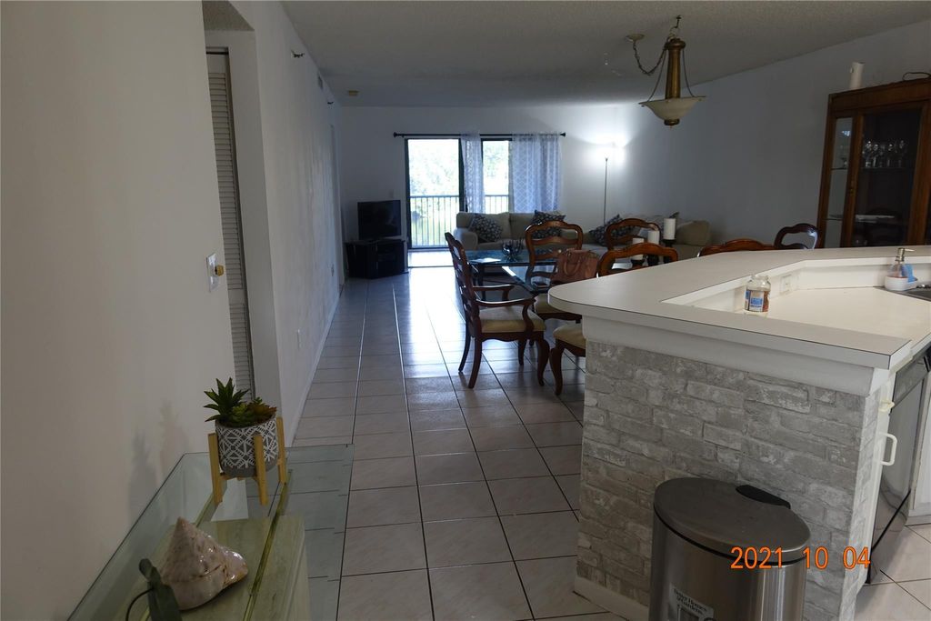 Photo of 2334 S Cypress Bend Drive #205, Pompano Beach, FL 33069 (MLS # F10398926)