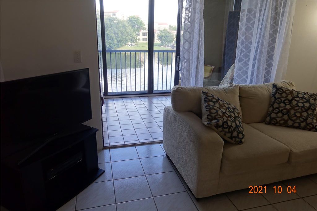 Photo of 2334 S Cypress Bend Drive #205, Pompano Beach, FL 33069 (MLS # F10398926)