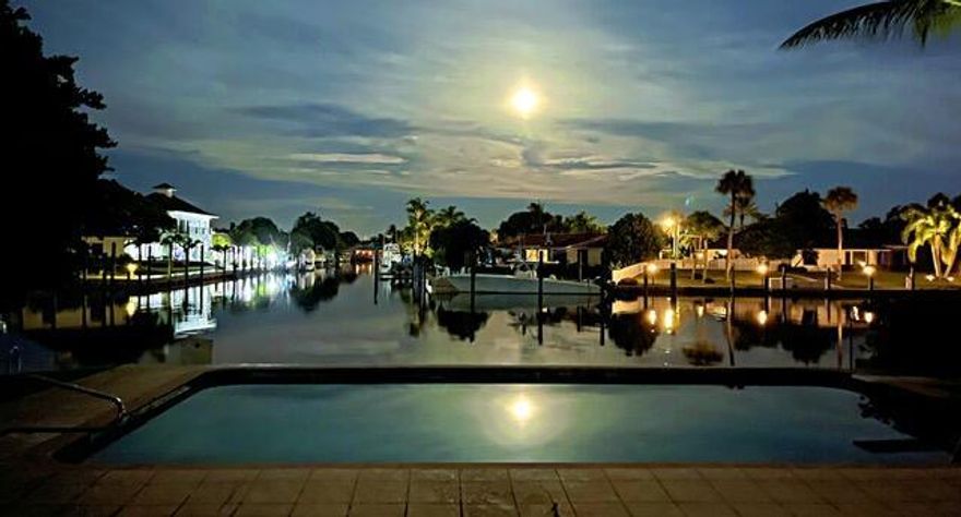 Premier waterfront property is finally available in the highly desirable neighborhood of the Village of North Palm Beach. This rare waterfront gem features approximately 100 ft of breathtaking water views. The 4 BD residence is located on a prime street in the neighborhood and has southeast exposure in the back combined with an oversized resort style pool. Don't miss out call for your private showing today!!!