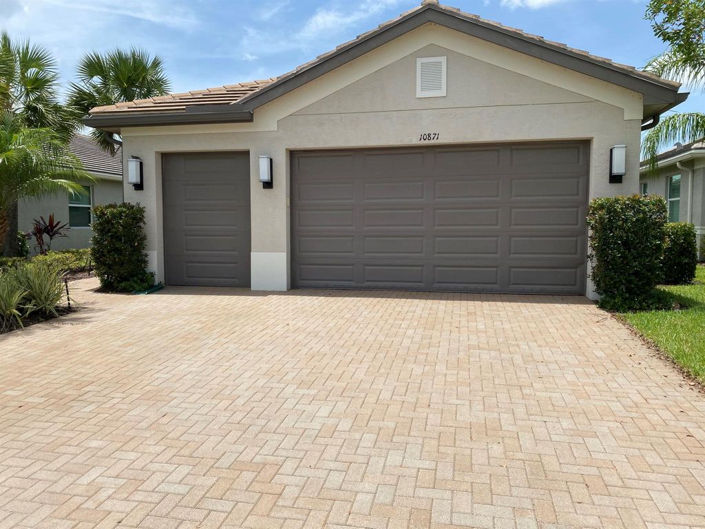 Photo of 10871 SW Sunray Street, Port St Lucie, FL 34987 (MLS # R10901021)
