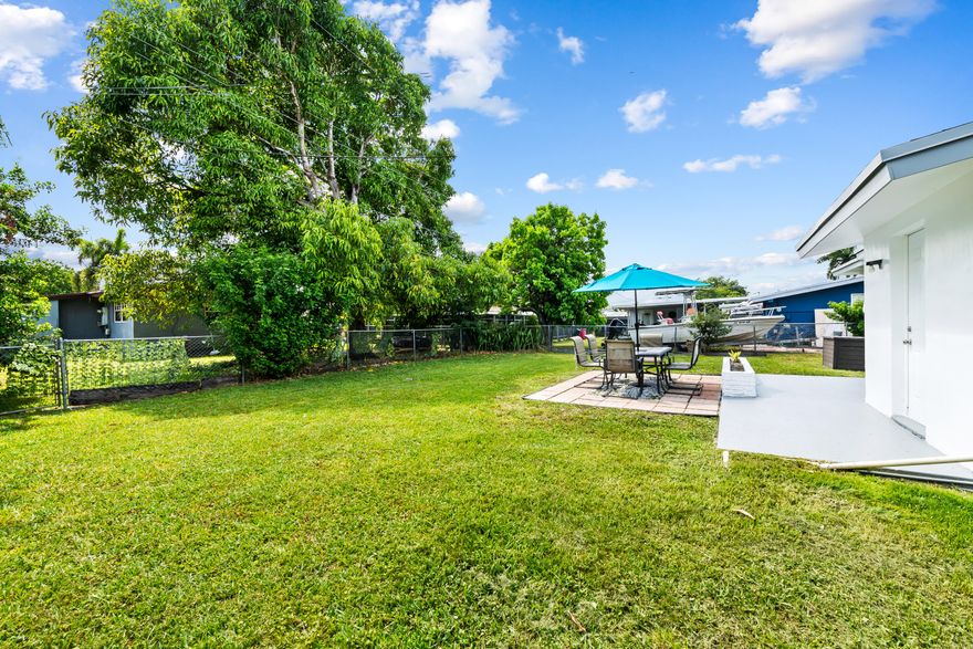 Beautifully updated home featuring an upgraded kitchen and bathroom, tile flooring throughout, new roof (2024), and new A/C (2025). Enjoy peace of mind with an impact sliding door, plus a huge backyard with plenty of room for a pool, entertaining, or future expansion. Additional highlights include extra storage space and a new generator. Conveniently located near schools, shopping, dining, and major highways.