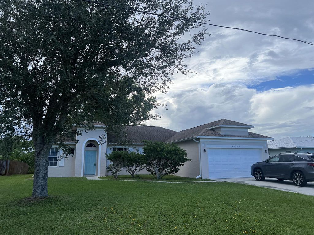 Photo of 2474 SE Perugia Street, Port St Lucie, FL 34952 (MLS # R11108463)