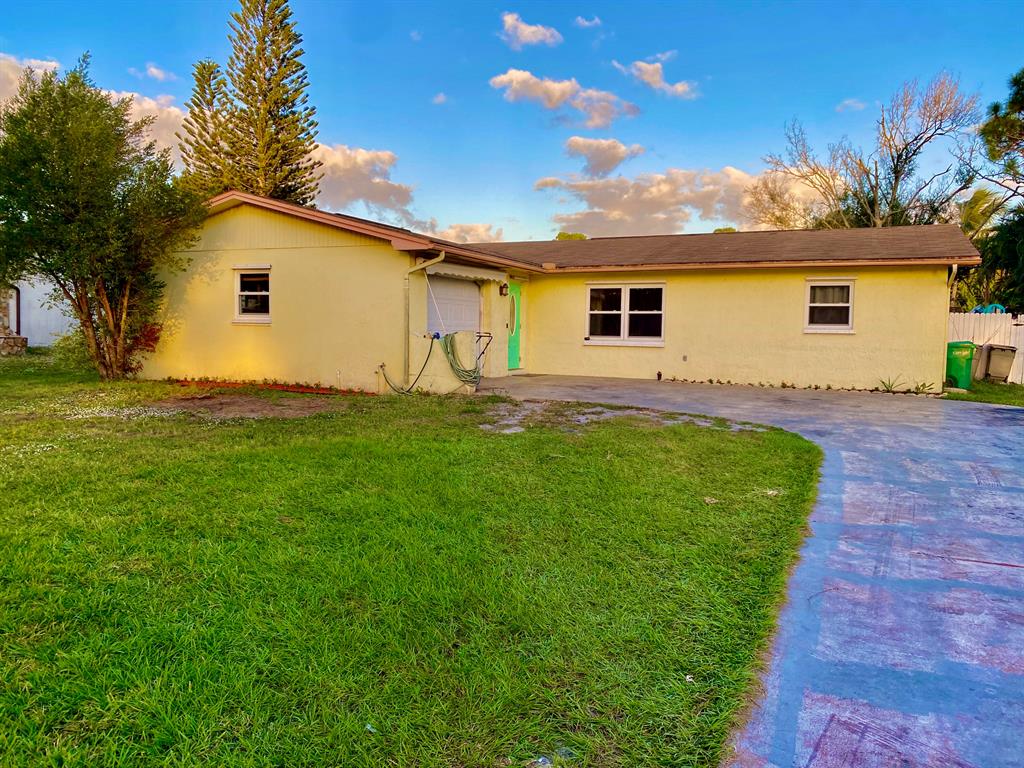 Photo of 6014 Sunset Boulevard, Fort Pierce, FL 34982 (MLS # R10755076)