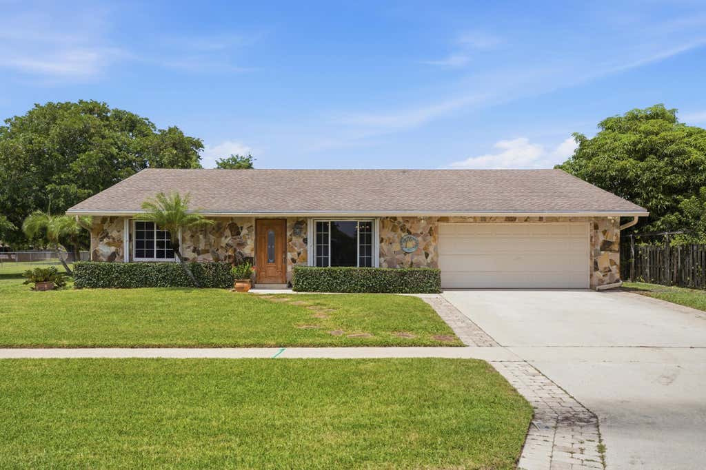 Photo of 4778 Blue Pine Circle, Lake Worth, FL 33463 (MLS # B26064880)