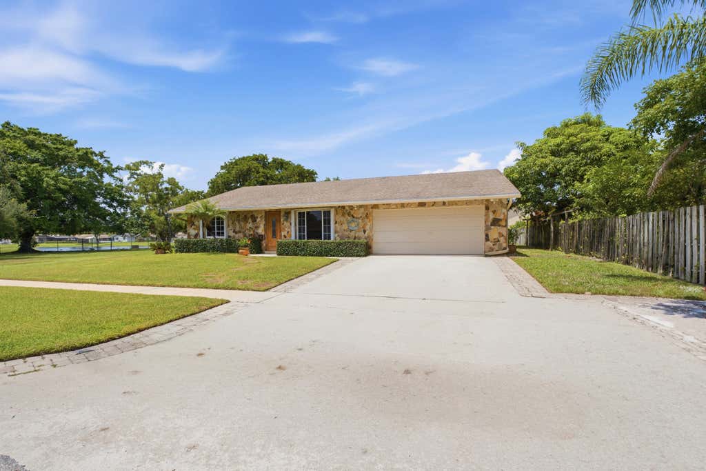 Photo of 4778 Blue Pine Circle, Lake Worth, FL 33463 (MLS # B26064880)