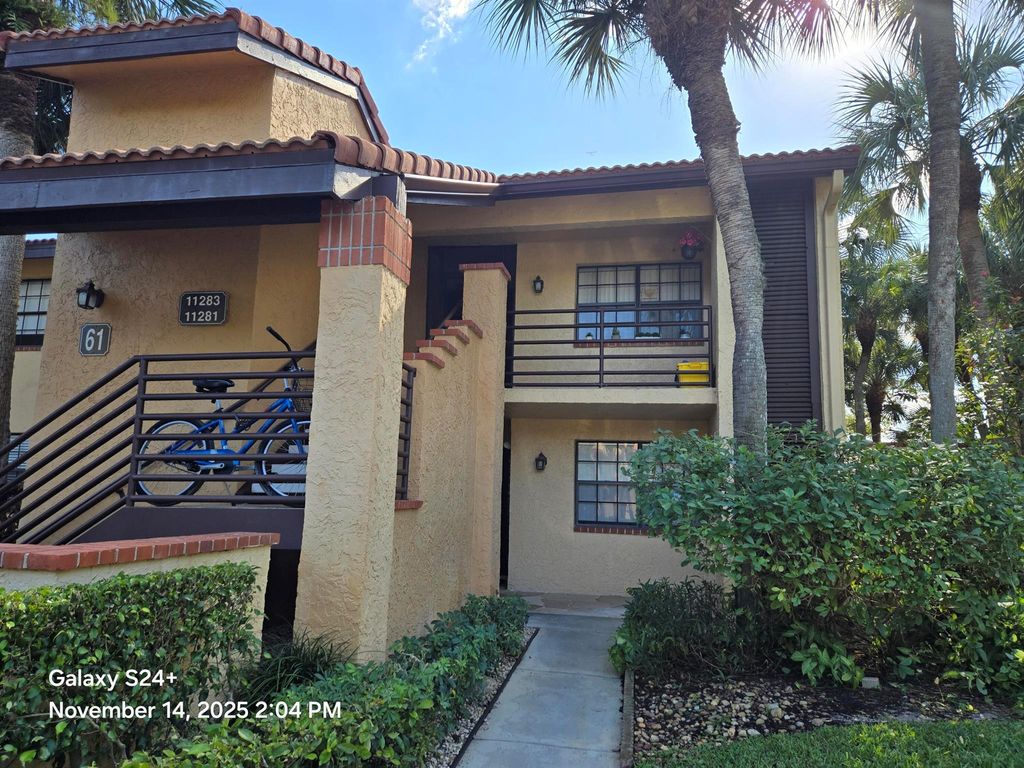 Photo of 11281 Aspen Glen Drive #104, Boynton Beach, FL 33437 (MLS # R11140232)