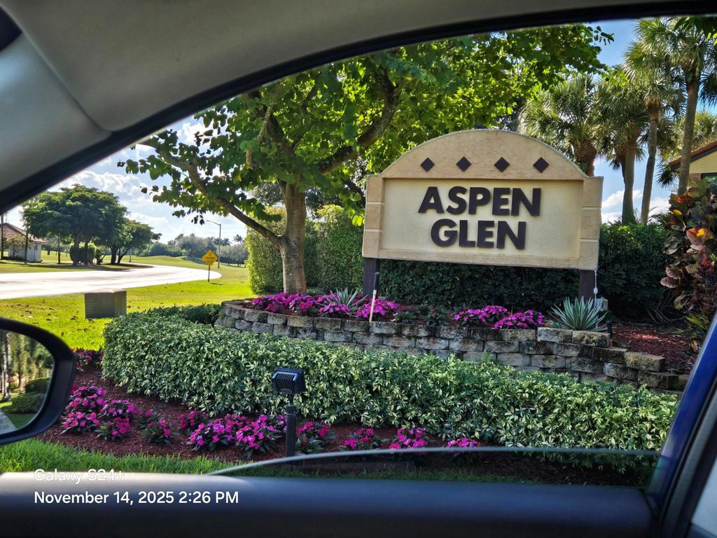 Photo of 11281 Aspen Glen Drive #104, Boynton Beach, FL 33437 (MLS # R11140232)