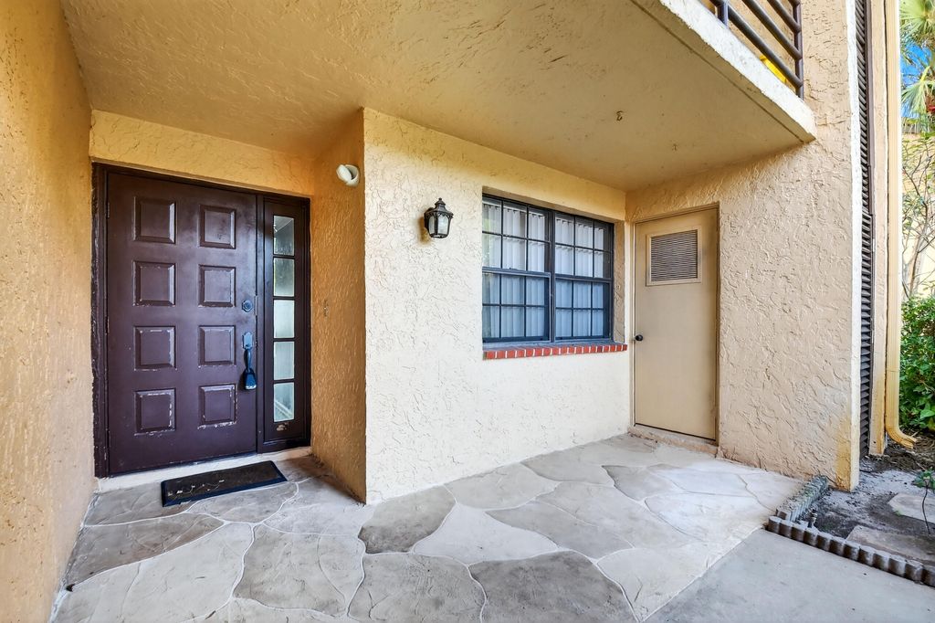 Photo of 11281 Aspen Glen Drive #104, Boynton Beach, FL 33437 (MLS # R11140232)