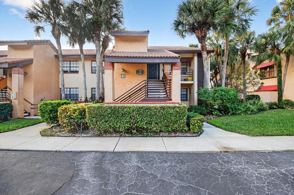 Photo of 11281 Aspen Glen Drive #104, Boynton Beach, FL 33437 (MLS # R11140232)