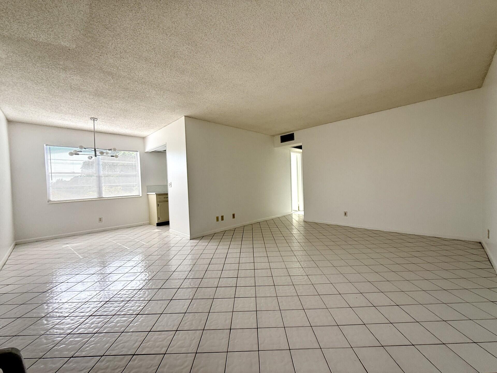 Spacious & Beautifully Maintained 2 Bedroom for Rent With Numerous Quality Updates. Gorgeous, long canal view from your living room. Neutral Tile Flooring Throughout. Updated bathroom with new surround. Delightful, screened lanai offers the perfect spot to take in the water views & Florida fresh air! This is your own quiet oasis in vibrant West Palm Beach, Florida! Century Village Is A 55+ Community with So Much to Offer.....shows, movies, clubs, pools, security, and transportation service. The Clubhouse features a theater, indoor pool, card room, community/party room, billiard room, shuffleboard, tennis, pickleball, bocce, and two outdoor pools. Numerous heated outdoor pools throughout the community.