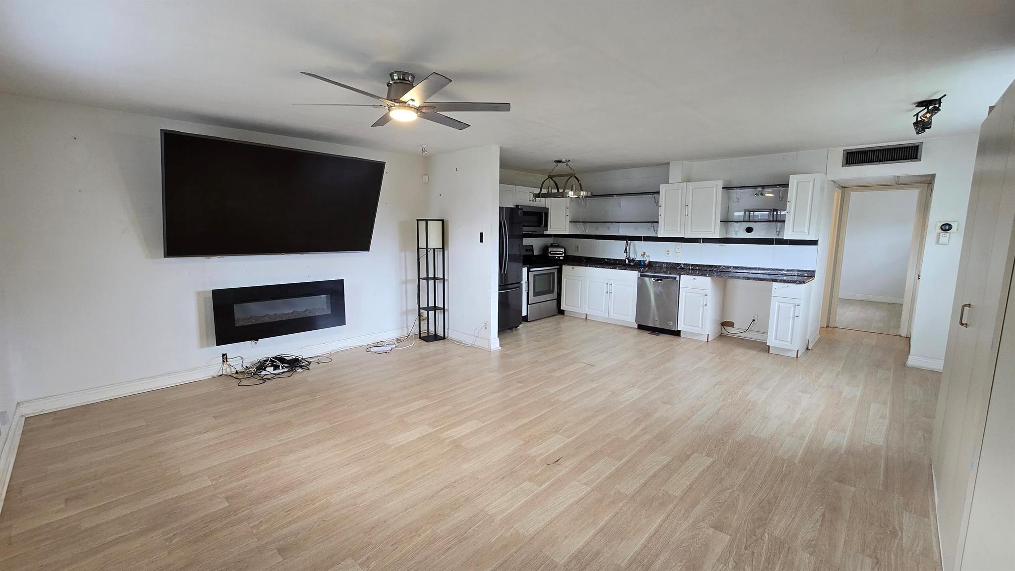 This tastefully renovated 1 bed/1.5 bath corner unit in Kings Point, Delray Beach blends comfort, convenience, and resort-style living. This end unit enjoys extra windows that invite abundant natural light, making the home brighter and more comfortable. AC 2018 with a brand-new compressor, new water heater, and all appliances serviced regularly. Electric fireplace with remote included. Smart-home features with Amazon Alexa included for control of the lights and AC. Kings Point offers two 18-hole golf courses, tennis and pickleball, indoor and outdoor pools with hot tubs, fitness centers, and a vibrant clubhouse with clubs and activities. Gated community with no membership required. Seller welcomes all reasonable offers! Schedule a showing today to see this great home at a great price!