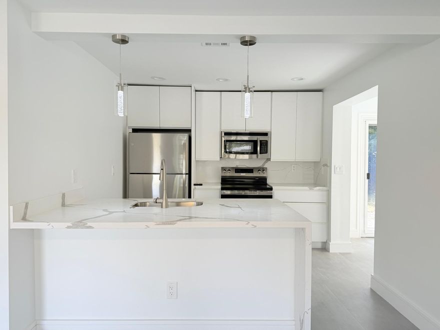 Beautifully renovated 3-bedroom, 2-bath home featuring modern updates throughout. Enjoy the convenience of an in-unit laundry area with washer included. This move-in ready property offers a spacious layout and a large backyard--perfect for entertaining, relaxing, or creating your own outdoor oasis. A must-see!