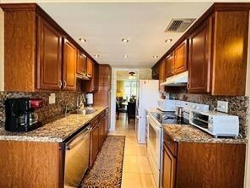 Fully furnished and available immediately, this turnkey unit is minutes from downtown, the beach, and major highways. Recently renovated with an updated kitchen, open-concept layout, and split-bedroom floor plan. Enjoy beautiful nature views and a comfortable, move-in ready space. Association requires a minimum 650 credit score. Schedule your showing today.