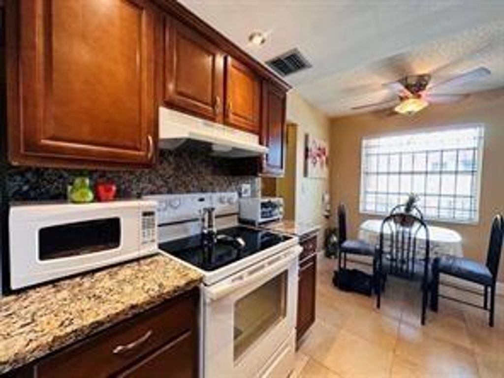 Photo of 3099 NW 48th Avenue #253, Lauderdale Lakes, FL 33313 (MLS # B26003494)