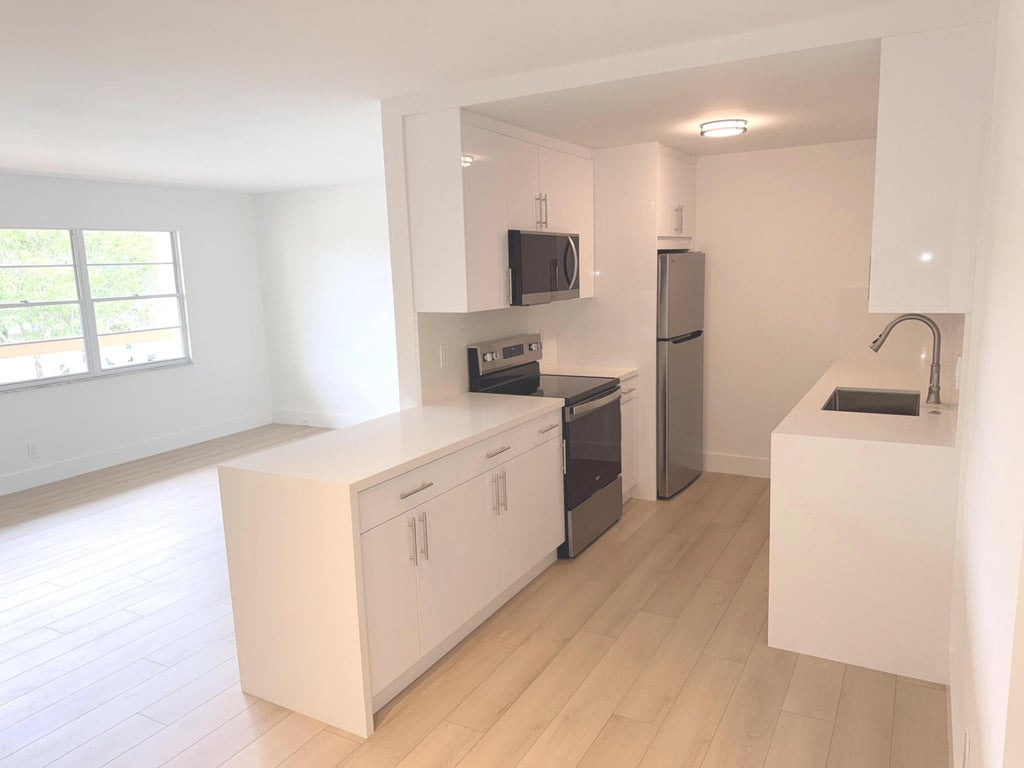 Photo of 2103 LUCAYA Bend #E3, Coconut Creek, FL 33066 (MLS # B26074368)